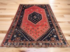 A Shiraz carpet, South-West Iran, 285 cm x 202 cm.