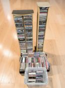Two CD towers and two boxes containing assorted CDs including Queen, Keane, Paul Mccartney & Wings,