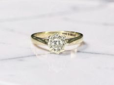 A 9ct gold diamond solitaire ring,