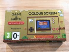 A Nintendo Game & Watch Super Mario Bros colour screen console, in box.