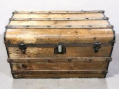 An early 20th century pine and metal bound trunk, width 84 cm.