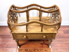 A Victorian walnut fretwork Canterbury, width 53 cm.