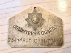 A brass Coldstream Guards barrack room locker plate, numbered 23474800 Chilton W, width 11.5 cm.
