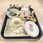 A group of Beswick figures including Beatrix Potter, Disney,