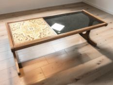 A G-Plan rectangular coffee table with smoked glass and tile inset top, length 121 cm.