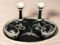 A Setem Ware five piece dressing table set on black ground.