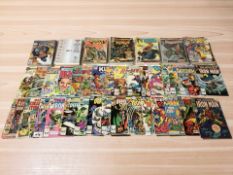 Assorted vintage and modern Marvel and DC Comics including The Invincible Iron Man issues 1 and 2,