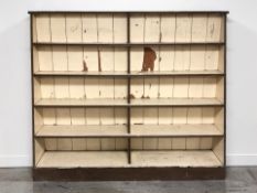 A Victorian distressed painted pine waterfall bookcase, 185 cm x 39 cm x 159 cm.