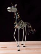 A contemporary wrought metal figure of a unicorn,