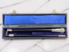 A George V silver-mounted ebony conductor's baton, engraved 'P.R.S., 1928, R. W.