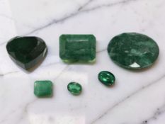 A group of synthetic/simulated emeralds, suitable for mounting in jewellery,
