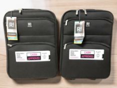 Two Revelation luggage bags, height 55 cm.