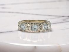 A 9ct gold topaz dress ring,