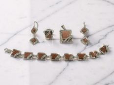 A suite of silver sunstone jewellery, comprising a bracelet, length 20cm, pendant, pair of earrings,