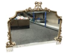 A late Victorian gilt overmantel mirror, width 132 cm.