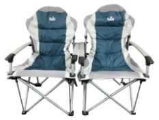 A pair of Royal folding outdoor chairs with carry bags.