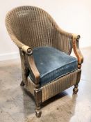 An oak and loom armchair,