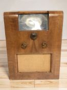 A mid century walnut cased valve radio,