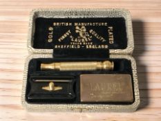A Laurel gold plated safety razor in original box.