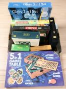 A group of board games, glass chess / backgammon / draughts set, a five-in-one games table set, etc.