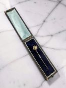 A gold stick pin set with a small diamond CONDITION REPORT: 1.