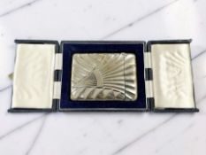 An Art Deco style silver card case, maker LL, Birmingham 1989, length 10cm, cased.