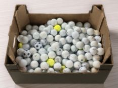 A large quantity of golf balls (one box)