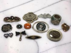 A group of Victorian pinchbeck brooches, silver bangle, brooches,