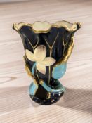 A Mintons gilded floral vase, height 16 cm.