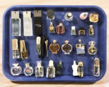 A group of perfumes and fragrances including Giorgio Armani, Hugo Boss, Balenciaga, Dior, etc.