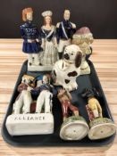 A group of Staffordshire figures including two figures of boxers : 'Tom Molyneux and Tom Cribb',