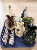 A group of pottery fish gluggle jugs, pair of decanters, etc.