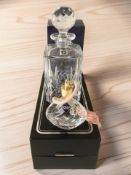 An Edinburgh Crystal atomiser and a decanter with stopper, both boxed.