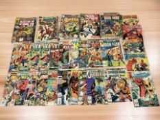 Seven Marvel Comics including The Invincible Iron Man, The Amazing Spider-Man, Moon Knight, X-Men,