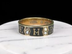 A 15ct gold black enamel and seed pearl mourning ring with the initials EHR,