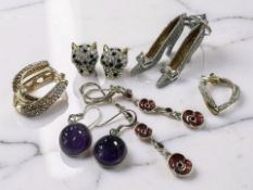 A pair of Butler & Wilson earrings in the form of high heels,