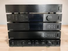 An Audiolab hi-fi separates stack, with various leads.