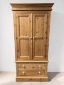 A modern pine double door wardrobe,