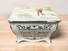 A Royal Doulton biscuit box and cover in the form of a chest of drawers 'Ride a Cockhorse to