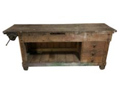 An antique pine workbench, 191 cm x 50 cm x 82 cm.
