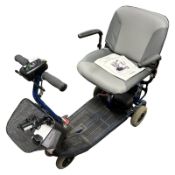 A Sterling Microlite mobility scooter with lead and manual.