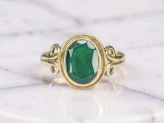 A 9ct gold emerald ring, size P CONDITION REPORT: 2.
