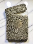 An ornate Edward VII silver calling card case, John Hines, Birmingham 1902, length 9.5cm.