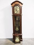 A reproduction long case clock, height 180 cm, and a mantel clock.