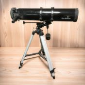 A Sky Watcher telescope on tripod