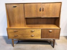 A G-Plan teak Fresco cocktail sideboard, 153 cm x 44 cm x 135 cm.