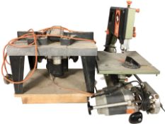 A DeWalt DW100 table saw, an Elu router and a Black & Decker router table.