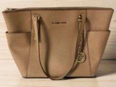 A lady's Michael Kors leather handbag, width 37 cm.