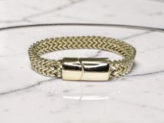 A heavy gilded metal gent's herringbone bracelet.