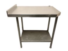 A stainless steel catering table, width 86 cm.